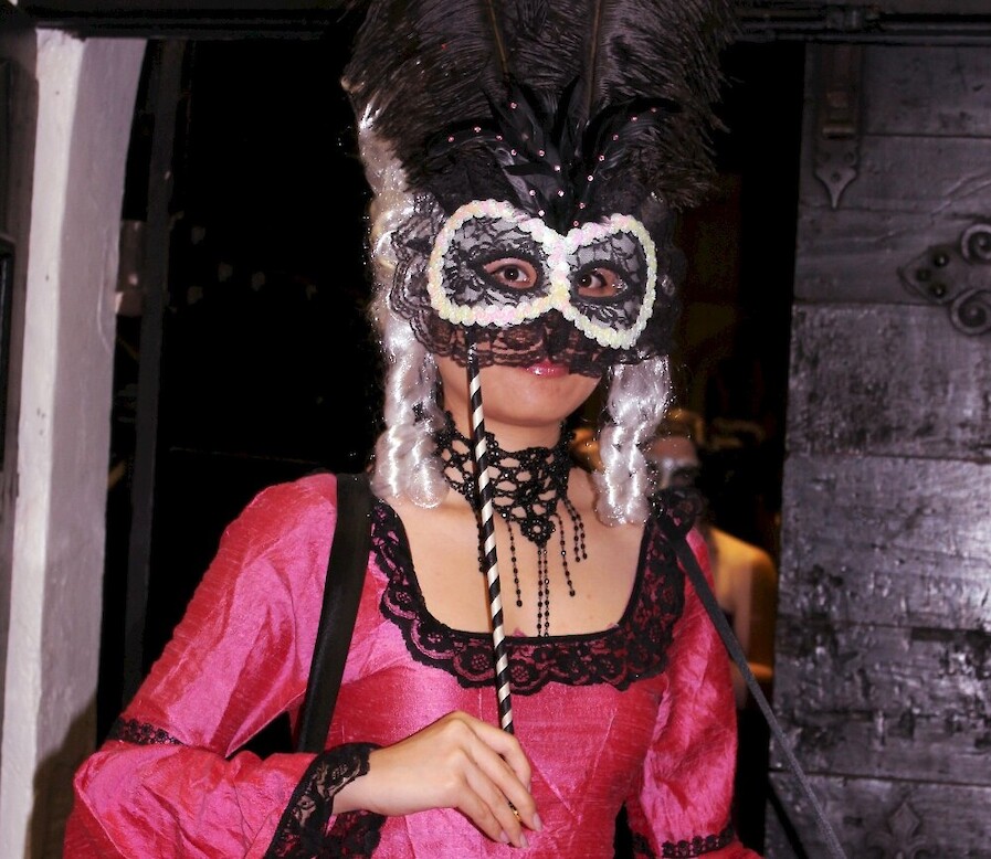 masquerade stilt walker
