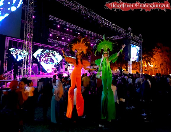 carnival stilt walkers