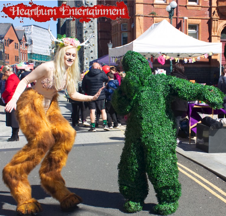 fawn stilt walkers